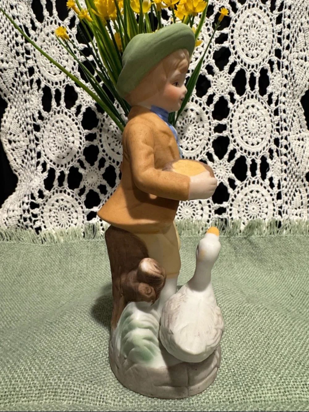 Boy Figurine with A Duck or Goose - White and Pastel Colors